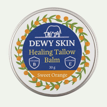 Macro close-up of Dewy Skin Natural Healing Tallow Balm Sweet Orange jar